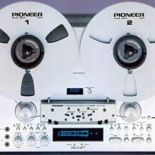 Reel-to-reel audio tape recording wallpaper