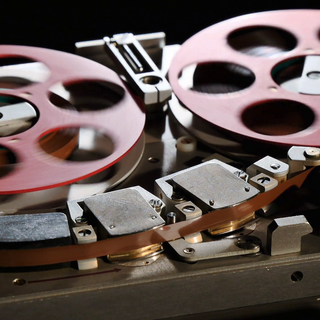 Reel-to-reel audio tape recording wallpaper
