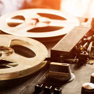Reel-to-reel audio tape recording wallpaper