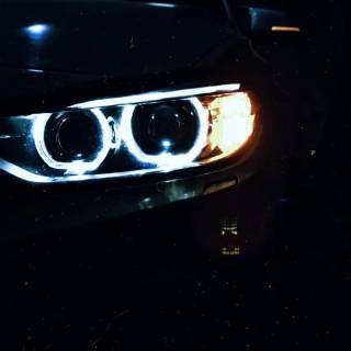 BMW headlights phone wallpaper