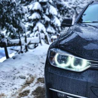 BMW M4 snow forest mobile wallpaper
