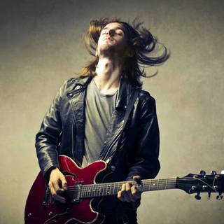 Boy with guitar wallpaper