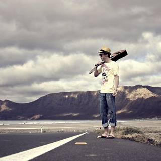 Sad boy with guitar wallpaper