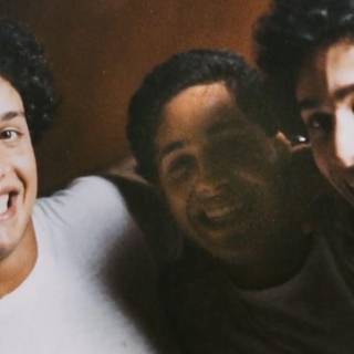 Three Identical Strangers wallpaper