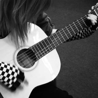 Wallpapers of a boy alone with guitar