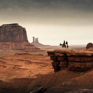Western cowboys and indians wallpaper