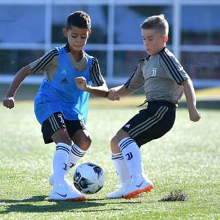 Cristiano Ronaldo and Ronaldo Jr wallpaper