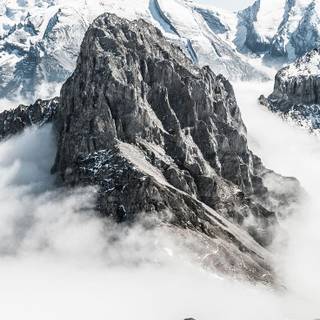 Bottom of snowy mountain wallpaper