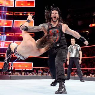 Roman Reigns and Paige wallpaper