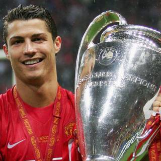 Cristiano Ronaldo with UCL trophy wallpaper