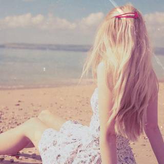 Girl on beach wallpaper