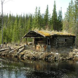 Riverside cabin wallpaper