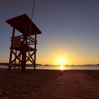 Sunset watchtower seascape wallpaper