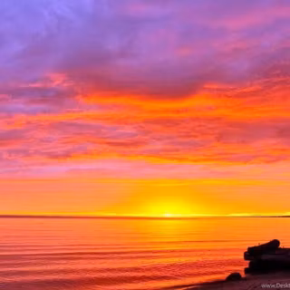 Sunrise over the beach wallpaper