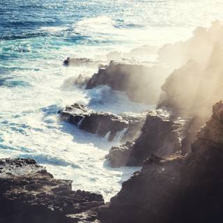 Sunshine, sea and rocks wallpaper
