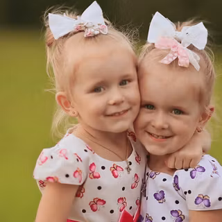 Twin sisters wallpaper