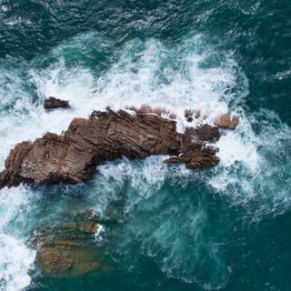 Rocky shore drone view wallpaper