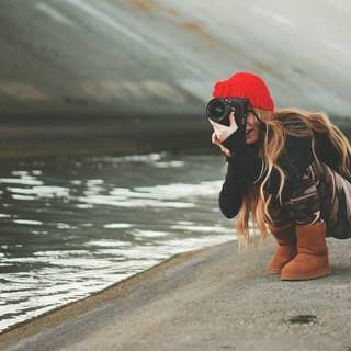 Girl with camera wallpaper