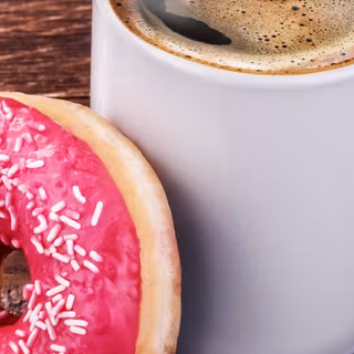 Coffee with a donut wallpaper