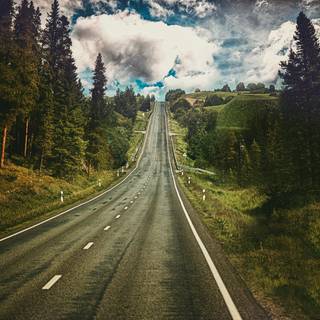 Cloudy empty road wallpaper