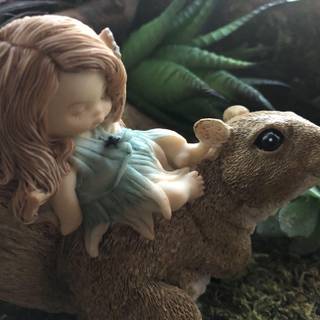 Fairy and squirrel wallpaper