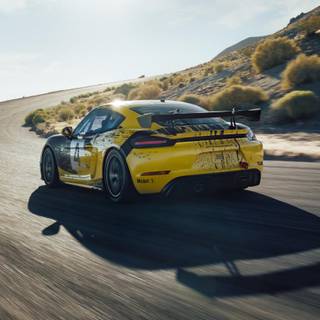 2019 Yellow Porsche 718 Cayman GT4 Sports Car wallpaper