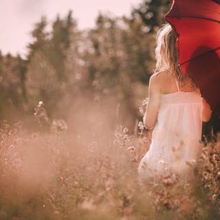 Girl and parasol wallpaper