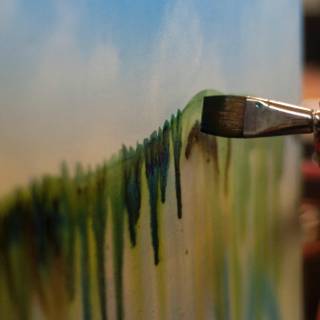 Girl and paintbrush wallpaper