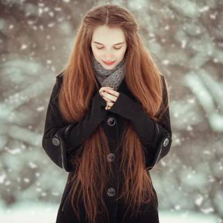 Girl and snow wallpaper