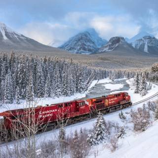 Red train in snow wallpaper