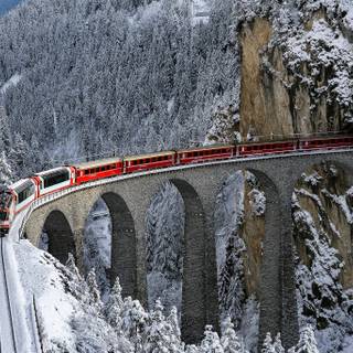 Red train in snow wallpaper