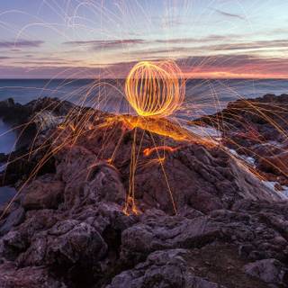 Fireworks at sunset wallpaper