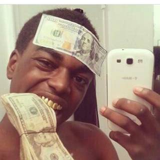 Rapper with money wallpaper