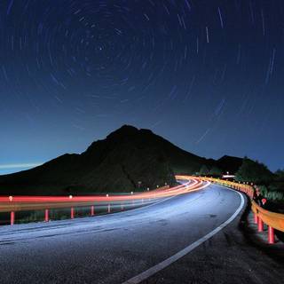 Road mountain stars sky wallpaper