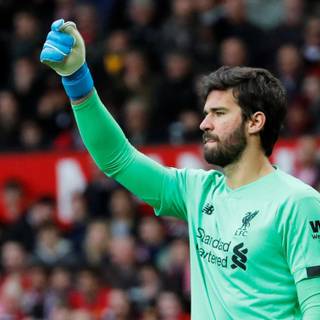 Alisson Becker free kick saved wallpaper