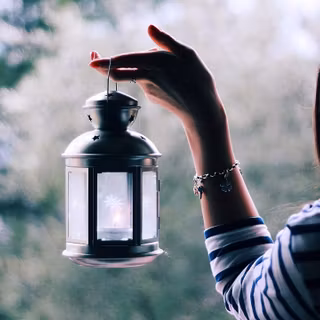 Girl with lantern wallpaper