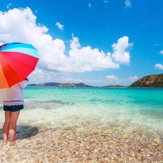 Rainbow beach umbrella wallpaper