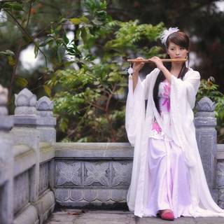 Girl and flute wallpaper