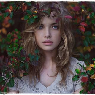 Girl and leaves wallpaper