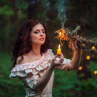 Girl and candle wallpaper