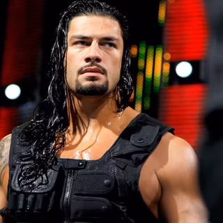 Roman Reigns with lightning wallpaper