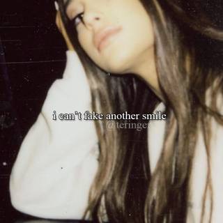 Ariana Grande fake smile wallpaper