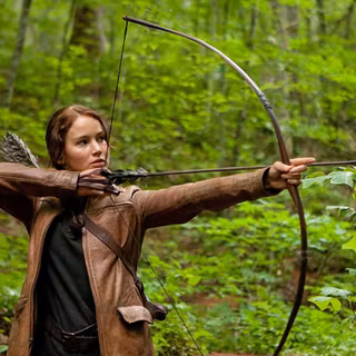 Girl with bow and arrows wallpaper