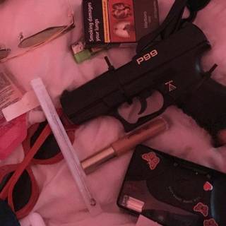 Aesthetic girl with gun wallpaper