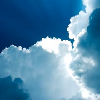 Sun behind clouds wallpaper