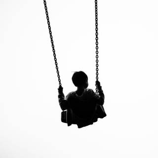 Child alone at swing wallpaper