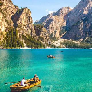 Boat mountains lake water wallpaper