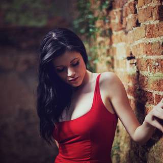 A women in black and red wallpaper