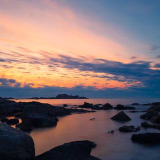 Sunset bridge sea rocks clouds wallpaper