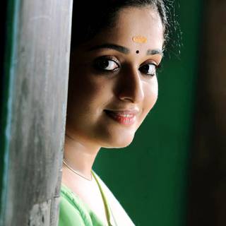 Kavya Madhavan close up wallpaper